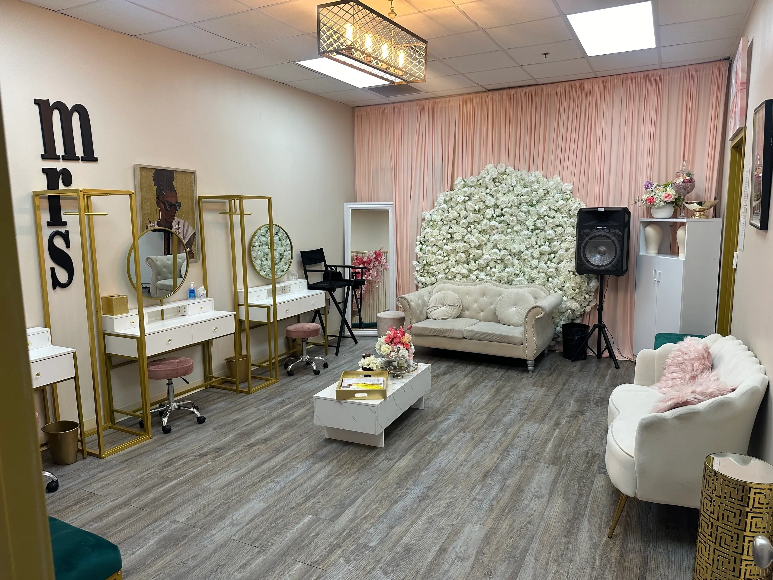 Glamorous vanity area with floral backdrop